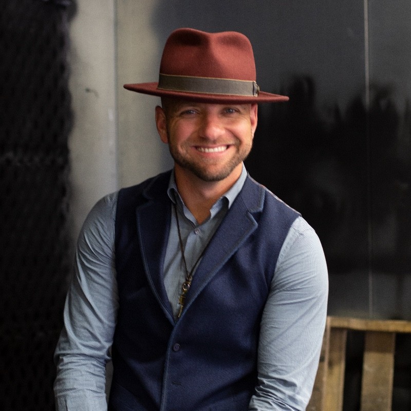 Headshot of AJ Calvin<br />
